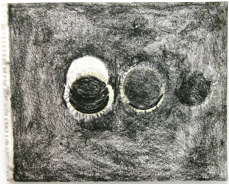 An image of three spherical shapes against a negative space. The shapes look like representations of an eclipse: the leftmost shape is a central white circle and a black circle offset below it. The black circle has small rays. The middle circle is entirely black with rays. The rightmost circle is all black, smaller, and has much less defined rays.
