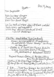 A notebook page with text reading 