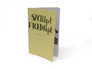 A photograph of a small publication with a pale yellow cover, bearing the text 