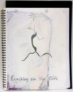 A stylized stick figure, with some depth in the body and legs, appears in the center of this image. Its legs are splayed and one arm is thrust back, one arm is reaching up. Three stars are in the top of the image. The text 